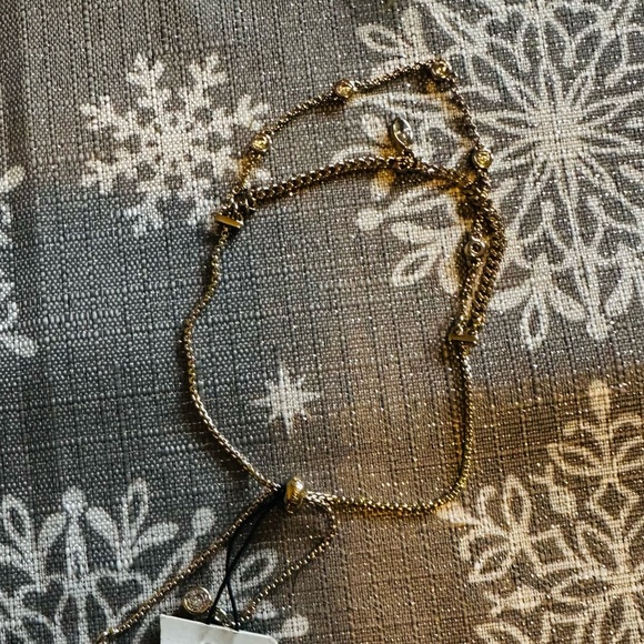 Givenchy Bracelet NWOT as it felll off.  Cubic Zirconia and Gold. Sliding sizer - Picture 3 of 5